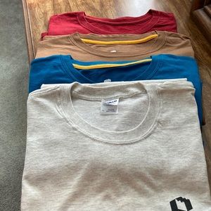 Four Men’s XL tee shirts. (3 w/pockets)